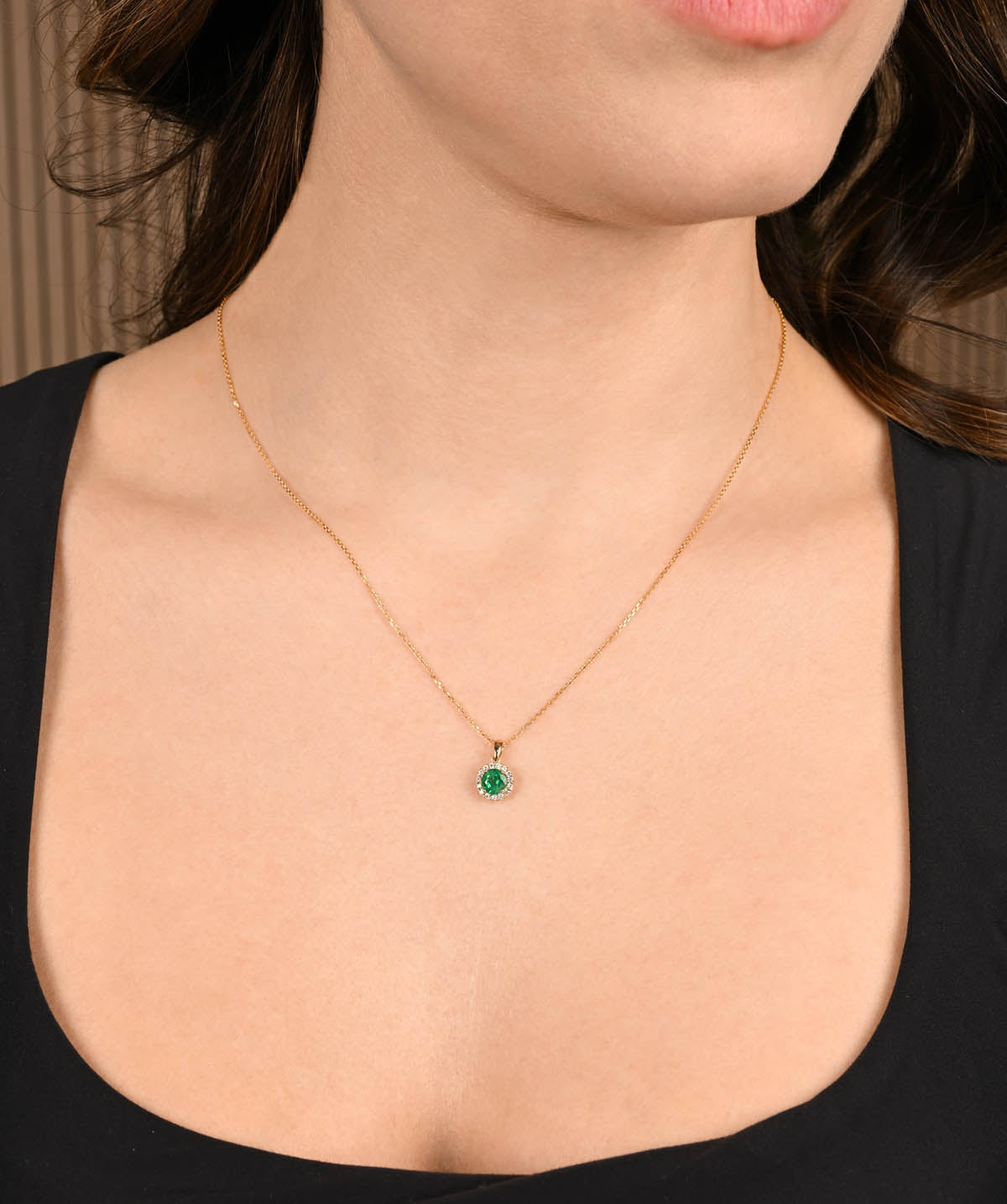 14K Yellow Gold 0.61ct Emerald and Diamond Halo Pendant